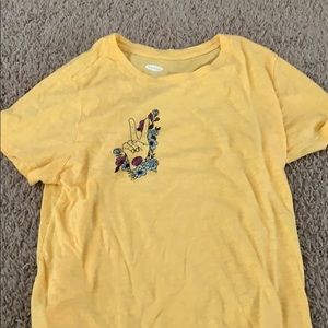 yellow peace sign shirt